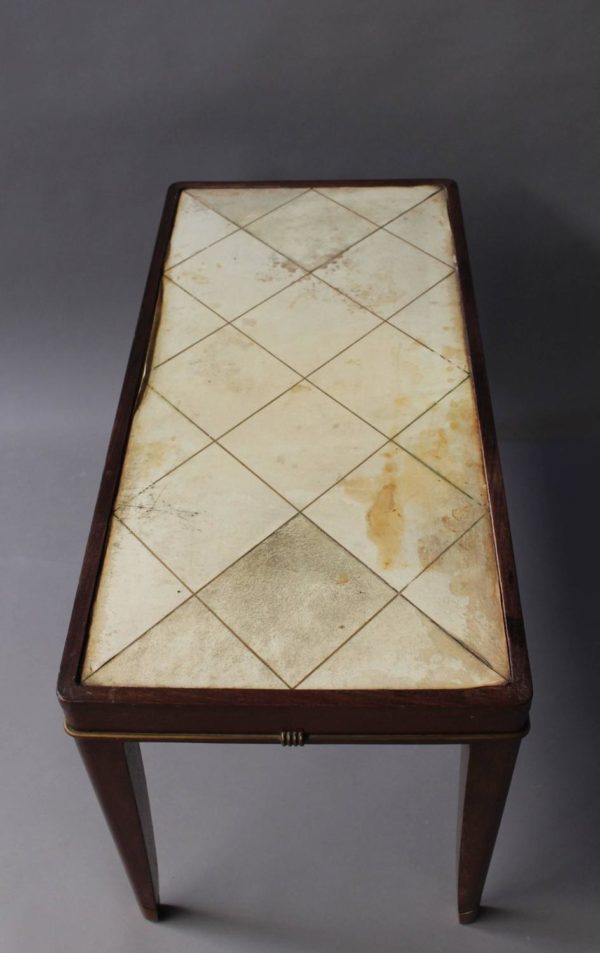 A Fine French Art Deco Mahogany Coffee Table with a Parchment Top and Bronze Details - Image 8