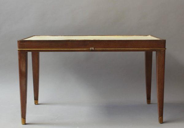 A Fine French Art Deco Mahogany Coffee Table with a Parchment Top and Bronze Details - Image 9