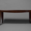 A Fine French Art Deco Mahogany Dining Table in the style of Jean Pascaud