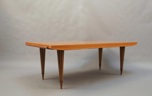 A Fine French Art Deco Expandable Dining Table with Ribbed Brass Conical Legs - Image 9