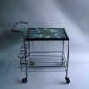 A French 1950's Wrought Iron and Enameled Stone Rolling Cart
