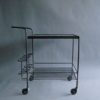 A French 1950's Wrought Iron and Enameled Stone Rolling Cart