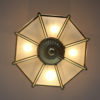 A Fine French Art Deco Octagonal Bronze and Glass Chandelier by Petitot