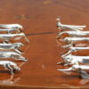 A Set of 12 Fine French Art Deco Knife Rests by Gallia for Christofle