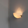 A fine French Art Deco White Opaline and Bronze Sconce by Perzel
