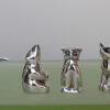 Set of 4 Christofle 'Gallia' silver plated Figural Salt and Pepper Shakers