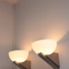 A pair of Fine French Art Deco Brushed Nickel and Glass Sconces by Jean Perzel - Image 3