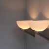 A pair of Fine French Art Deco Brushed Nickel and Glass Sconces by Jean Perzel - Image 11