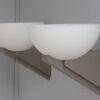 A pair of Fine French Art Deco Brushed Nickel and Glass Sconces by Jean Perzel - Image 2